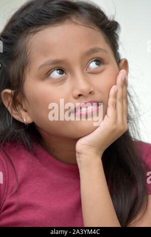 Daydreaming Youthful Filipina Person Stock Photo