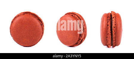 Three chocolate macarons isolated on white background. Stock Photo