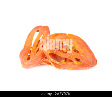 Mace, nutmeg flower, myristica fragrans, isolated on white background. Natural spice in Indian cooking. Asian seasoning for baking and desserts. Stock Photo