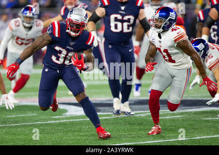 Foxborough, United States. 10th Oct, 2019. New England Patriots running back Brandon Bolden (38) charges up field while chased by New York Giants free safety Antoine Bethea (41) in the first quarter at Gillette Stadium in Foxborough, Massachusetts on Thursday, October 10, 2019. Photo by Matthew Healey/UPI Credit: UPI/Alamy Live News Stock Photo