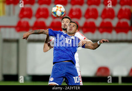 Krusevac. 10th Oct, 2019. Paraguay's Derlis Gonzales (front) vies with Serbia's Filip Mladenovic during the friendly match between Serbia and Paraguay in Krusevac, Serbia on Oct. 10, 2019. Credit: Predrag Milosavljevic/Xinhua/Alamy Live News Stock Photo
