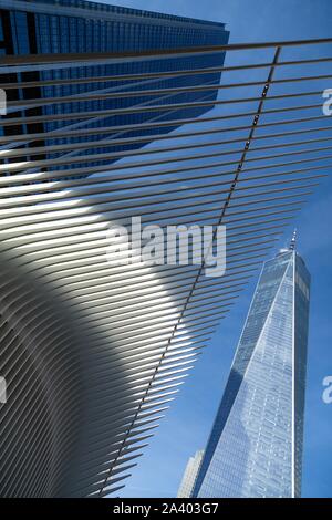 DETAIL OF THE OCULUS, FUTURIST STATION IN THE FORM OF BIRD'S WINGS IN FRONT OF THE ONE WORLD TRADE CENTER TOWER, MANHATTAN, NEW YORK, UNITED STATES, USA Stock Photo