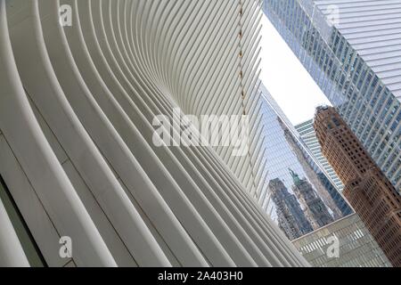 DETAIL OF THE OCULUS, FUTURIST STATION IN THE FORM OF BIRD'S WINGS IN FRONT OF THE ONE WORLD TRADE CENTER TOWER, MANHATTAN, NEW YORK, UNITED STATES, USA Stock Photo