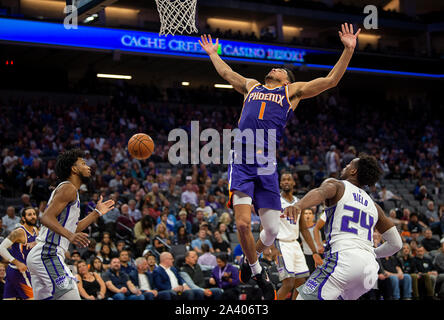 Sacramento, CA, USA. 10th Oct, 2019. Sacramento Kings guard Buddy Hield (24) fouls Phoenix Suns guard Devin Booker (1) during a game at Golden 1 Center on Thursday, October 10, 2019 in Sacramento, Calif. Credit: Paul Kitagaki Jr./ZUMA Wire/Alamy Live News Stock Photo