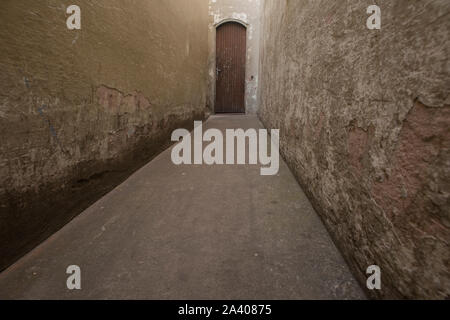 Sao Paulo, Brazil - December 18, 2015: Tenement corridor of downtown Sao Paulo; many old abandoned buildings are invaded by poor families in the area Stock Photo