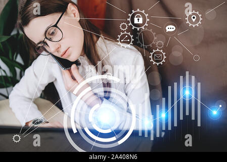 Businesswoman in glasses working on laptop. Protection network security computer and safe your data concept. Digital crime by an anonymous hacker Stock Photo