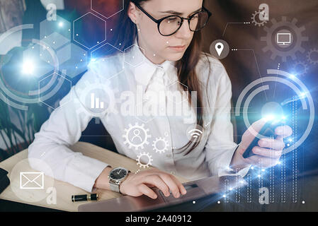Woman in glasses using mobile smartphone with icon graphic cyber security network of connected devices and personal data information. Protection netwo Stock Photo