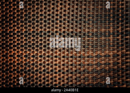 Dark brown wicker texture background. detail of weave seamless texture. Stock Photo
