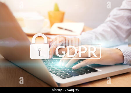 cyber security and privacy concept. people using personal computer with text GDPR or General Data Protection Regulation text secure with a padlock log Stock Photo