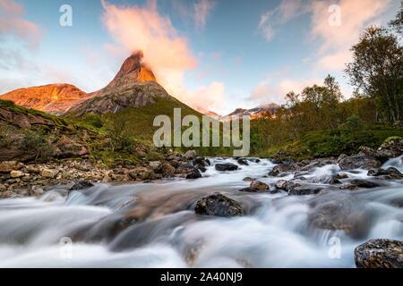 Stetind at sunset, Norwegian national mountain, in front torrent, Tysfjord, Ofoten, Nordland, Norway Stock Photo