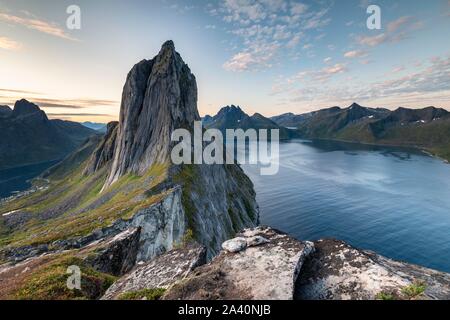 Steep mountain Segla, fjord Mefjorden with mountains, island Senja, Troms, Norway Stock Photo