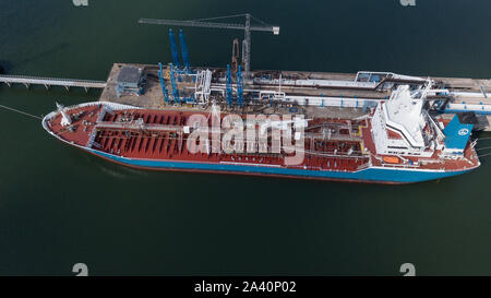 ship going in to Harbor Ventspils Latvia Aerial view of countryside drone top view Stock Photo