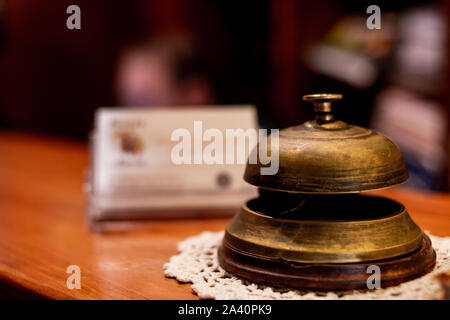 Old doorbell at hotel entrance Stock Photo