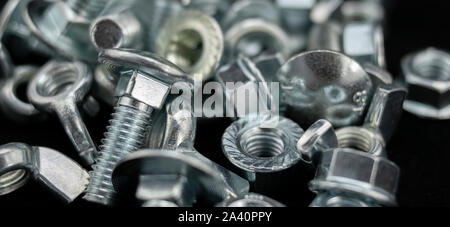 A lot of nuts, bolts and washers piled up Stock Photo