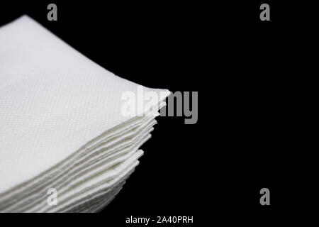 Corner of a lot of clean white napkins Stock Photo