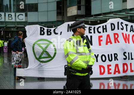BBC, Portland Place, London, UK. 11th Oct, 2019. Extinction Rebellion protesters outside the BBC in London. Credit: Matthew Chattle/Alamy Live News Stock Photo