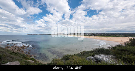 A panoramic image of Curl Curl and North Curl Curl Beach and pool looking from the northern end in Sydney Australia Stock Photo