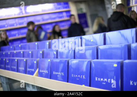 11 October 2019, Saxony, Chemnitz: Customers are standing in the record shop of Felix Kummer, frontman of the Chemnitz band Kraftklub. Kummer wants to personally sell his first solo album 'Kiox' for three days. On the new album, the 30-year-old raps in the song '9010' about his youth in Chemnitz, among other things - and the everydayness of right-wing violence long before the current events. Photo: Jan Woitas/dpa-Zentralbild/dpa Stock Photo