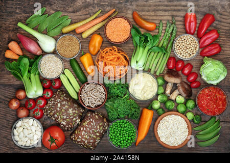 Low glycemic health food for diabetics with foods high in vitamins, minerals, antioxidants, smart carbs, omega 3 and protein. Below 55 on the GI index Stock Photo