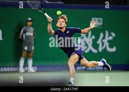 Belgian professional tennis player David Goffin competes against Swiss professional tennis player Roger Federer  during the third round of 2019 Rolex Shanghai Masters, in Shanghai, China, 10 October 2019. Belgian professional tennis player David Goffin was defeated by Swiss professional tennis player Roger Federer with 0-2 at the third round of 2019 Rolex Shanghai Masters, in Shanghai, China, 10 October 2019. Stock Photo