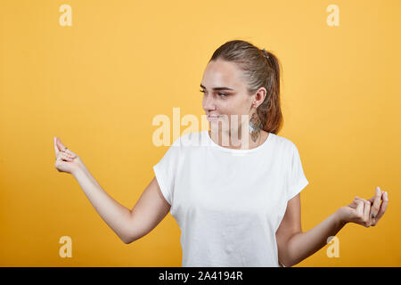 Way of enjoying music by chuckling as seen in picture Stock Photo