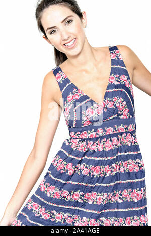 Beautiful young woman wearing a blue summer dress Stock Photo