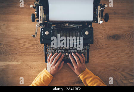 Typing on the vintage typewriter Stock Photo