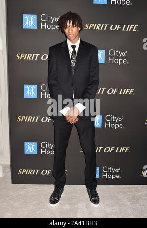 SANTA MONICA, CA - OCTOBER 10: Kofi attends the City Of Hope's Spirit Of Life 2019 Gala at The Barker Hanger on October 10, 2019 in Santa Monica, California. Stock Photo