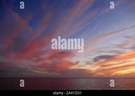 Sunset in Alghero, Sardinia, Italy. Colorful seascape on a summer night. Stock Photo