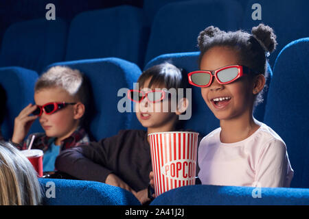 3D cute baby blue jay eating popcorn in a movie theater