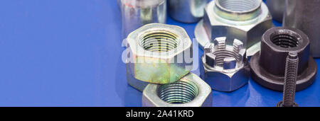 small bolts and nuts by manufacturing process ; tapping Stock Photo