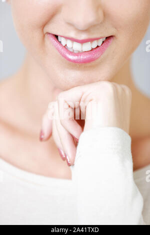 Attractive crop of a woman's face smiling Stock Photo