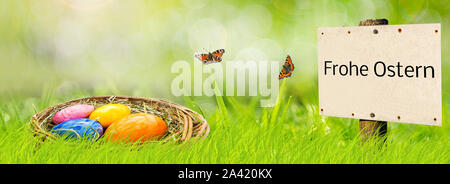 German Banner sign Happy Easter with Easter basket Stock Photo