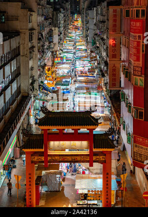 Night view of famous Temple Street Night market in Kowloon, Hong Kong. Stock Photo
