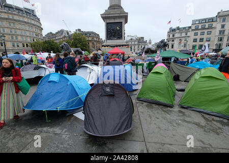 Trafalgar Square, London, UK. 11th October 2019. Extinction Rebellion climate change protesters in Trafalgar Square. Credit: Matthew Chattle/Alamy Live News Stock Photo