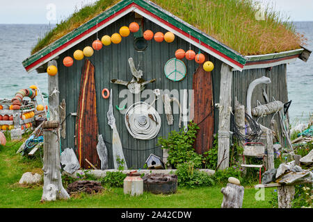 with whale bones and buoys decorated hut on the sea, Andenes, Norway, Europe Stock Photo