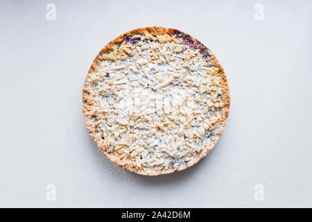 round cake on a white background. view from above. pasipan powder Stock Photo
