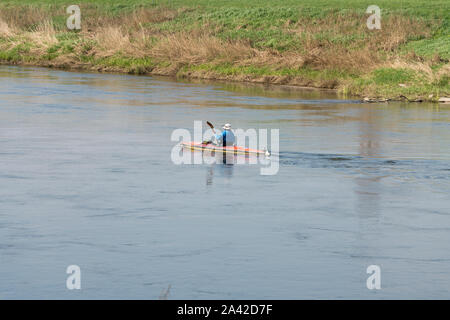 Canoe paddler on Weser river, Oberweser, Upper Weser Valley,  Weser Uplands, Hesse, Germany, Europe Stock Photo