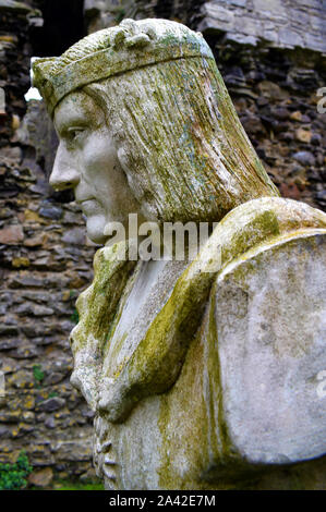 A portrait of the sickly King Richard III of England (From a statue at Middleham Castle, Yorkshire). In this picture he has a drip at the end of his nose as though suffering a cold.  During his adolescence, Richard developed idiopathic scoliosis with a deformity of his spine. Stock Photo