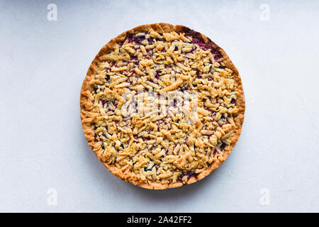 round cake on a white background. view from above. pasipan powder Stock Photo
