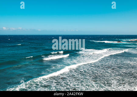 ocean landscape, sea waves on sunny  day with blue sky - Stock Photo