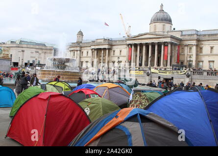 London, UK. 10th Oct, 2019. Protesters and tents during the demonstration.Extinction Rebellion demonstrators protest at the Trafalgar Square and Whitehall to highlight the 'climate emergency' facing the planet. Credit: SOPA Images Limited/Alamy Live News Stock Photo