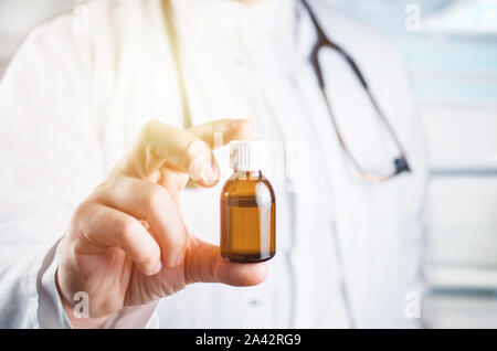 Doctor with a phial with medicine Stock Photo
