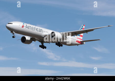 Boeing 777 - MSN 41668 - N719AN Airline American Airlines  coming down to land at London Heathrow Airport in the United Kingdom Stock Photo