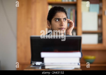 stundent yong woman learning in a room Stock Photo