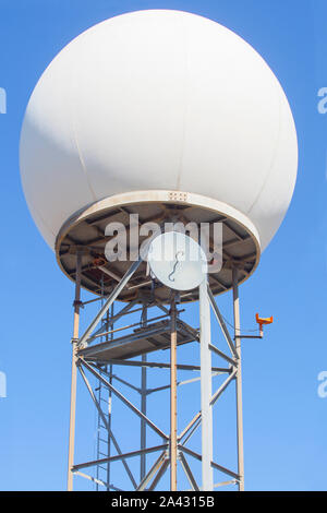 Meteorological radar station on the top of Sierra de Fuentes, Spain. Dome and tower over blue sky background Stock Photo