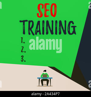 Handwriting text Seo Training. Conceptual photo learn specific knowledge improve perforanalysisce in current roles View young man sitting chair desk w Stock Photo