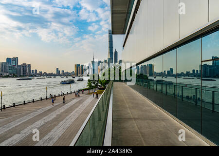 Shanghai Huangpu River Picturesque Leading Lines View of Promenade at Shanghai MOCA Museum of Contemporary Art During Sunset Stock Photo