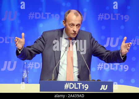 11 October 2019, Saarland, Saarbrücken: Friedrich Merz (CDU), Vice President of the Economic Council, speaks at the Germany Day of the Young Union. Among other things, this should be about climate protection. Photo: Harald Tittel/dpa Stock Photo