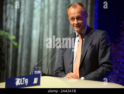 11 October 2019, Saarland, Saarbrücken: Friedrich Merz (CDU), Vice President of the Economic Council, speaks at the Germany Day of the Young Union. Among other things, this should be about climate protection. Photo: Harald Tittel/dpa Stock Photo